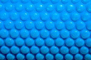 Four Reasons to Use a Solar Pool Cover in Conjunction with Your Solar Pool Heater